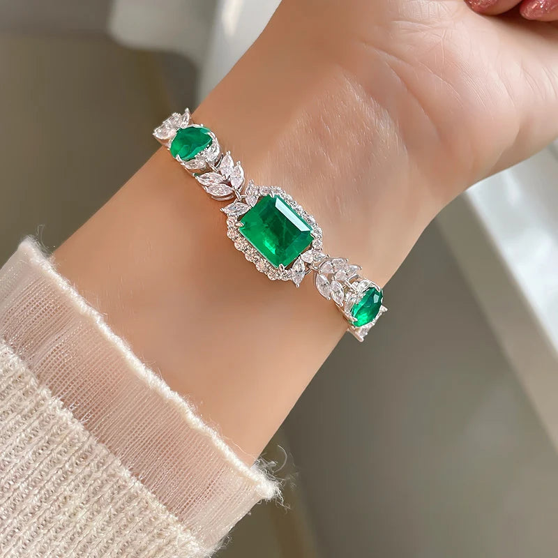 Silver Bracelet and Emerald Stones