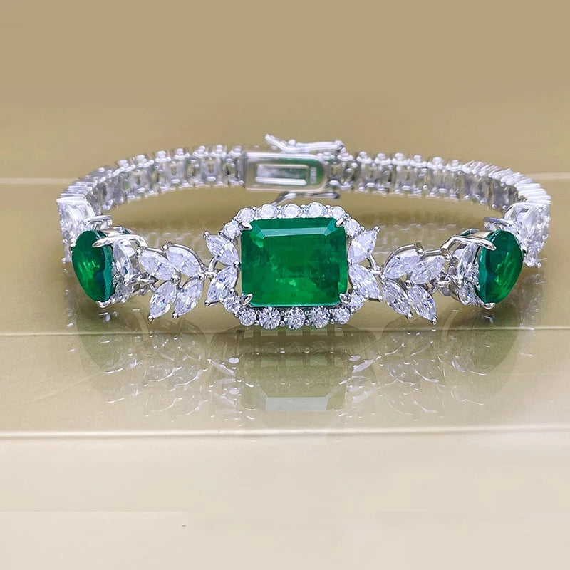 Silver Bracelet and Emerald Stones