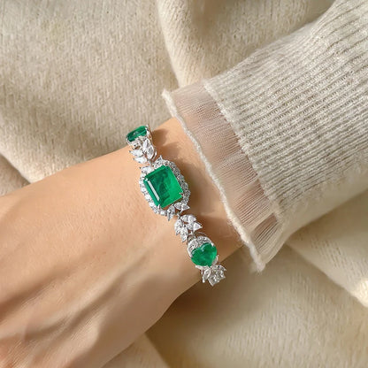 Silver Bracelet and Emerald Stones