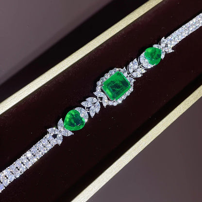 Silver Bracelet and Emerald Stones