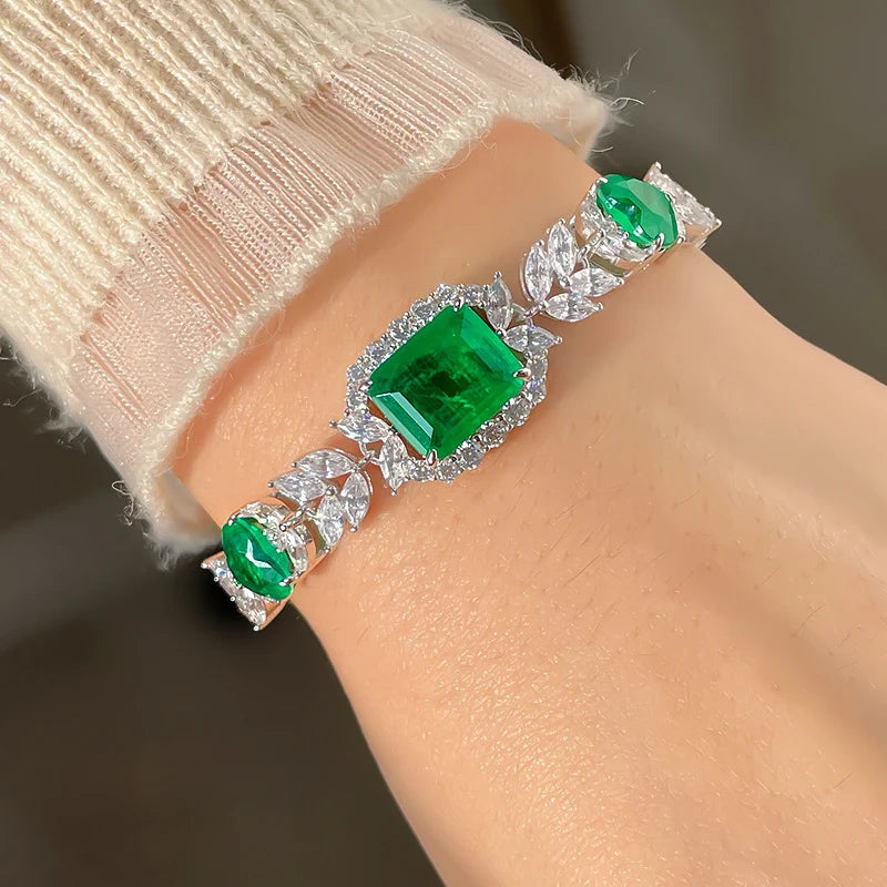 Silver Bracelet and Emerald Stones