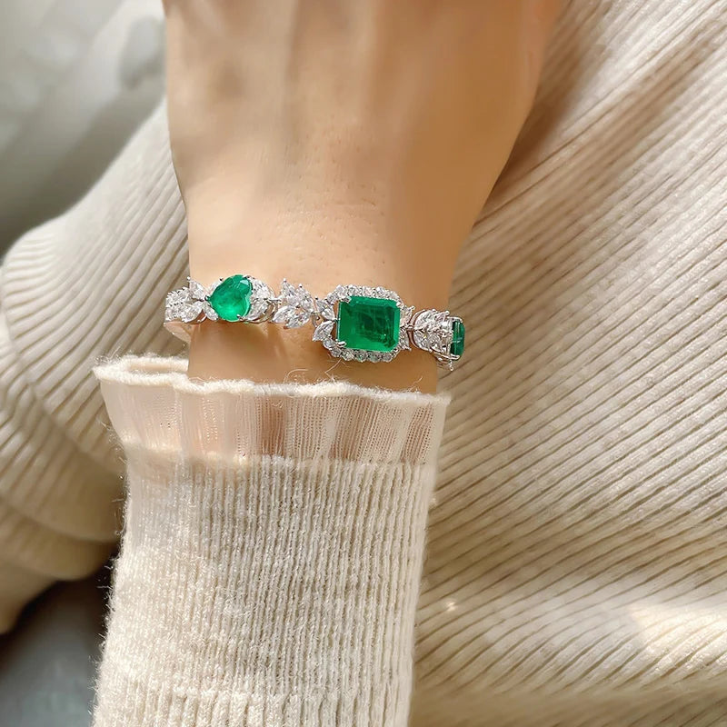 Silver Bracelet and Emerald Stones